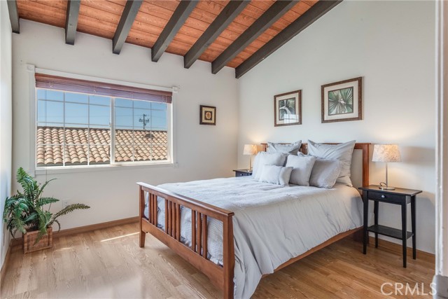 One of two spacious and bright guest rooms with west facing windows to capture the incredible beach breezes