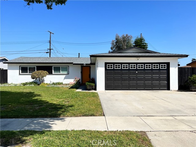 Great opportunity to own a GORGEOUS, TURNKEY home in this desirable Garden Grove community!  With a lot size of roughly 6,000 square feet, this show-stopper will provide a respite from the hustle and bustle of everyday life.  Recently RENOVATED with light oak Vinyl flooring, the home features a Contemporary, Aesthetic-Pleasing design from top to bottom. In the KITCHEN, you will find Beautiful Quartz Countertops and Mosaic Backsplash, a brand new Samsung Range with Oven, brand new Black Stylish Hood, brand new Dishwasher, brand new windows and doors throughout the house, beautiful white cabinets with contrasting brass knobs, a farmhouse sink, and dark shelvings right above the sink with pendant lights. Dining area with exquisite chandelier. The living room has an electrical fireplace sandwiched in between floating wooden shelves, and electrical outlet ready for TV hookup.  All bedrooms also come with brand new Vinyl floorings, new windows, new floor to wall closet sliding doors. Both bathrooms boast gorgeous undermount ramp sinks atop new, handleless gray and white cabinets.  The bathrooms are further accented with glass-encased standing showers with matte black single function shower heads, and similarly designed black mosaic tiles for the walls and floors.  New Vinyl Blinds installed on all windows throughout the home. Gorgeous BlackOut Curtains installed at the sliding door. The deck has also been newly painted with a wrap-around backyard filled with beautiful lively plants. Centrally located just a 3 minutes Drive / 10 minutes Walk to Christ Cathedral, UCI, the Outlets of Orange, and a short distance from the award winning Orange High School, this beautiful home is expected to go fast!