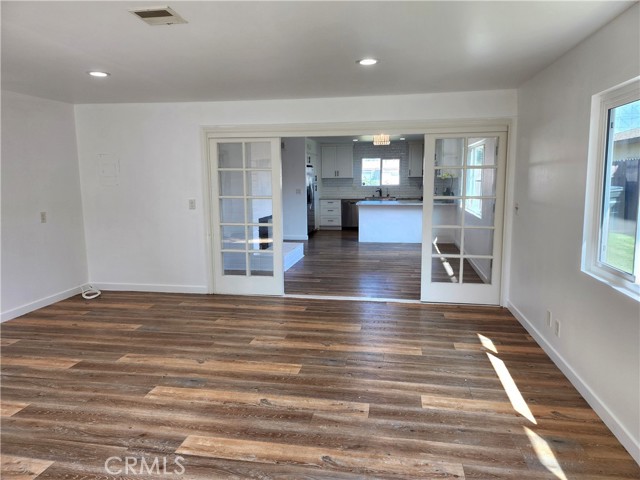 view from family room to dining room and kitchen