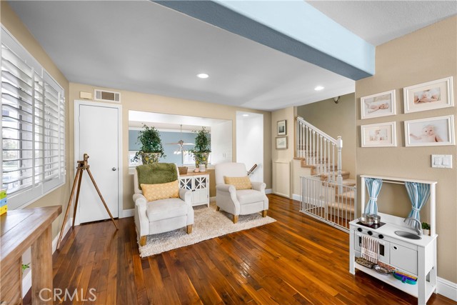 Family Room off nook and kitchen with Walnut floors