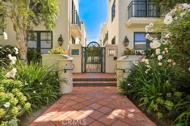 1114 Princeton Street 6 Santa Monica, California Sophisticated Mediterranean-style Townhouse in courtyard setting in Santa Monica (north of Wilshire and South of Montana). Bright front-unit with an abundance of natural light and with only one shared wall feels like a single family home on a desirable tree-lined residential street. The layout includes livingspaces including a large family room with fireplace, separate dining room/study, breakfast area attached to the kitchen, and half bathroom on the 1st floor, with all three bedrooms and two full bathrooms on the 2nd floor, plus separate 3rd floor loft/office. This 3 bedroom, 2 ½ bath + loft townhome has hardwood floors throughout, updated bathrooms each with Toto bidet/washlets, updated kitchen with quartz countertops and Thermador appliances, French doors that open onto a small private patio on the first floor, and an additional spacious private rooftop deck for indoor/outdoor living. Beautiful and large Main bedroom with cathedral ceilings, large windows throughout, walk-in closet and fireplace. There are balconies off each bedroom. The entire home has custom-installed window treatments and curtains. Direct access to an oversized, personal 2-car garage with storage built-ins and washer/dryer, and also an additional 3rd assigned parking space in the gated underground garage. Easy access to restaurants, coffee shops and markets like Trader Joe’s, Whole Foods, Erewhon, and Bristol Farms, as well as Douglas park with tennis courts, Bocce ball, skateboarding lot and community center with activities for family members of all ages. Accessible on weekends. Walking distance to Franklin Elementary School and close to Lincoln Middle School in the award-winning Santa Monica school district.