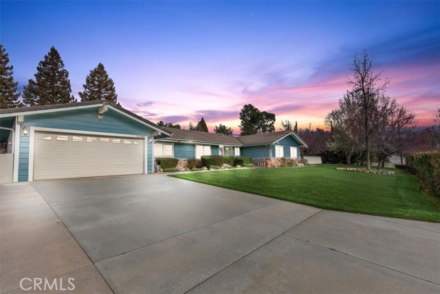 Nestled in the serene Hidden Meadows neighborhood of Yucaipa Valley, this enchanting single-story home is a true gem. Boasting 4 spacious bedrooms and 3 elegantly appointed bathrooms, this home is the epitome of fine country living. As you enter the home, you are greeted by a warm and inviting living room that features large windows, allowing natural light to flood the room. The open floor plan seamlessly leads you to the expansive dining area and a beautifully designed gourmet kitchen. The kitchen features custom oak cabinetry, high quality appliances, and a large center island, perfect for hosting large gatherings or preparing meals for your family and friends. The master suite is truly a sanctuary. With its own private pool entrance, the master bedroom offers ample space for a king-sized bed, a cozy sitting area, and a lots of closet space!  The spa-like bathroom is truly breathtaking, featuring a luxurious walk-in shower, and a double vanity. The additional bedrooms are equally impressive, with large windows and ample closet space. The bathrooms are beautifully designed and feature high-end fixtures and finishes. The backyard is a true oasis, featuring a sparkling pool and spa, perfect for entertaining or enjoying a relaxing evening at home. The covered patio area provides ample shade, and the well-manicured landscaping adds to the home's overall charm. From its Gated RV parking to its Storage Shed outbuilding, you will easily tuck away your toys and have lots of hobby space! Enjoy your lemonade on surrounded in the tranquil Oak Glen like setting, this home is truly a precious jewel in the Hidden Meadows neighborhood of Yucaipa Valley.  Where the country meets luxurious living nd serene surroundings, it is the perfect place to call your forever home!  Grab your Realtor and schedule a visit.