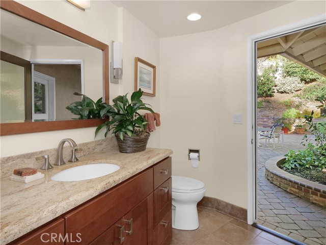 Bathroom 3 has handy pool access