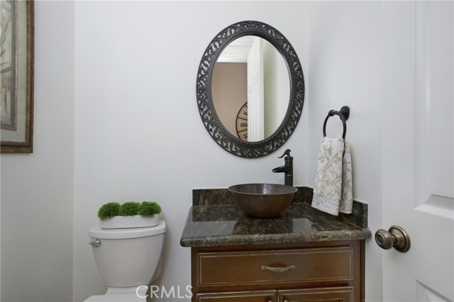 Guest powder room with custom vanity