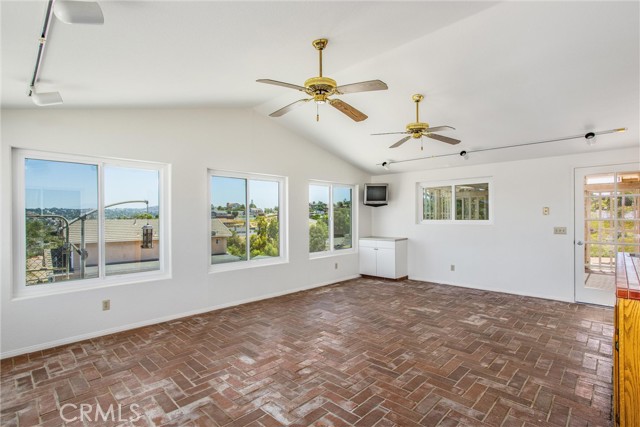 Large family room with ceiling fans