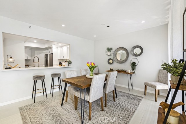 Dining room with large sliders leading to patio