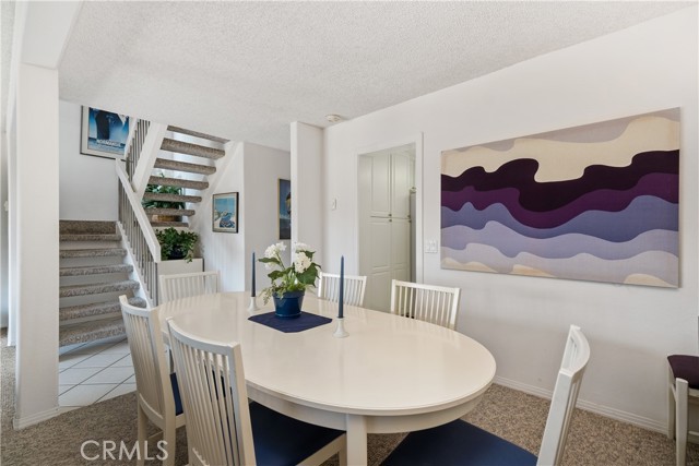 Dining Area toward Stairs and Kitchen Door