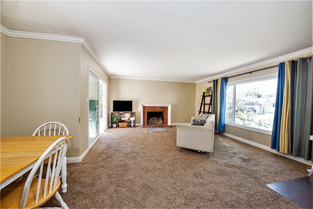 The large dual paned sliding glass door enters into the backyard.