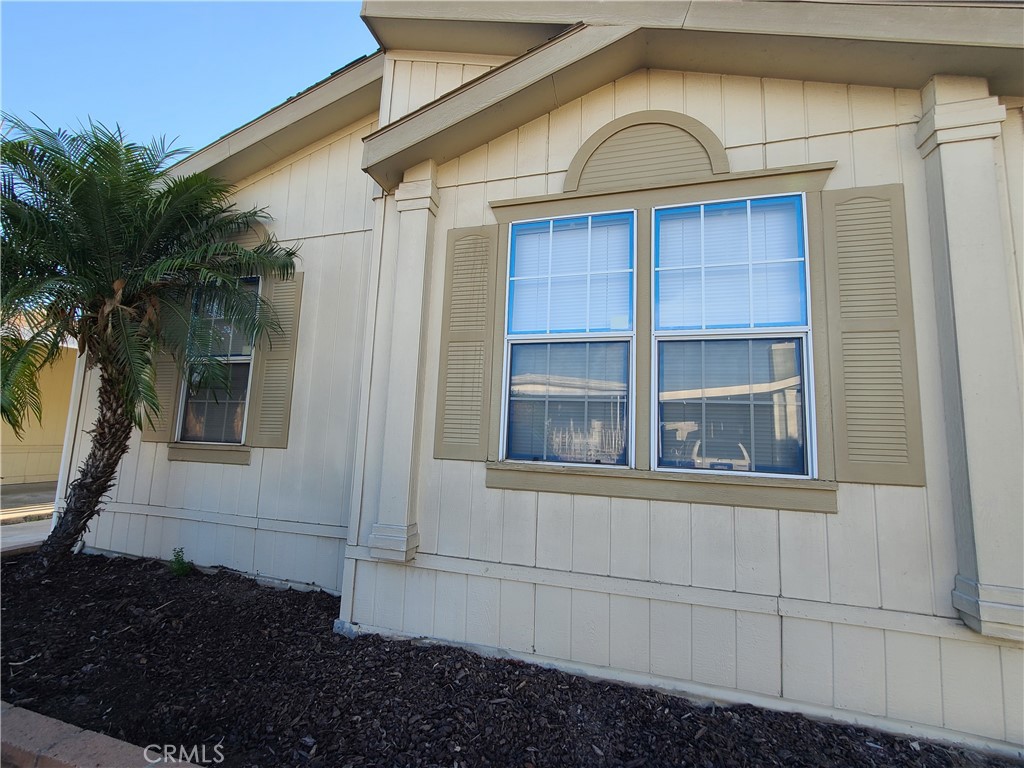9080 Bloomfield Avenue 208 Cypress, California Welcome Home! COMPLETELY REMODELED Kitchen to have an Open Concept Floor plan connecting Living room, Dining room and Kitchen! Cozy up in front of your wood-burning Fireplace in the Winter and take to the outdoors in the Summer to your paved Patio and Backyard! NEW FLOORS throughout the entire home with new paint and baseboards. Split floorplan separates the Master Suite from the Guest Bedrooms for privacy. Plenty of Natural Light in the Bathrooms from Skylights, plus Kitchen Skylight and Dormer Window in the Living Room! Attached 2 car Carport Parking, Large Storage Shed and Paved Lot for Low Maintenance! Laundry Room off Kitchen as part of Carport Entry. Lincoln Center is a Family/All-Age park loaded with amenities! Large Clubhouse with Banquet facilities, Billiards tables, friendly management staff plus heated year-round community swimming pool. Pet-friendly park with a playground and courts for your family to enjoy! This quiet park is located less than 10 minutes from the Long Beach Towne Center and (in the other direction) Cypress College. Close to the 91 Freeway and the I-605 Freeway. Easy distance to the entertainment, shopping and dining experiences of Knott's Berry Farm.