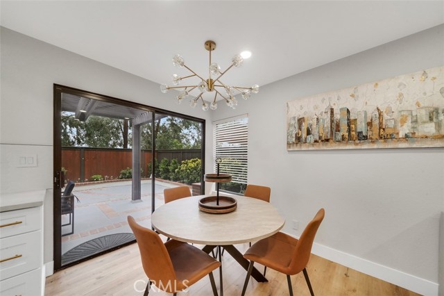 Dining area with bright, backyard access.