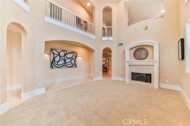 Living Room with Fireplace and Vaulted Ceiling