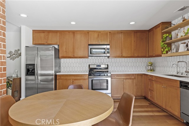 So much natural light in this eat in kitchen.