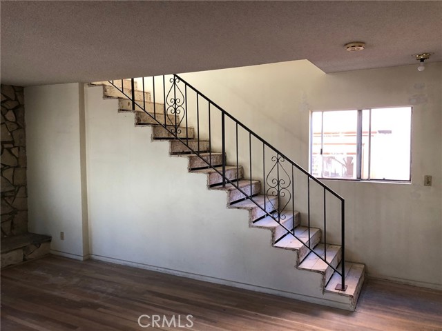 Stairways with fireplace off to the left