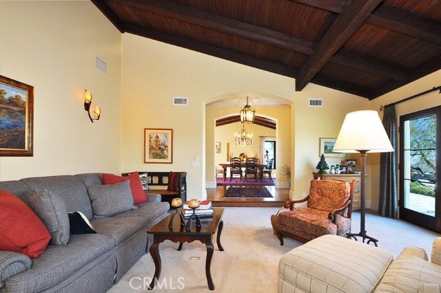 Living room looking toward the entry and dining room