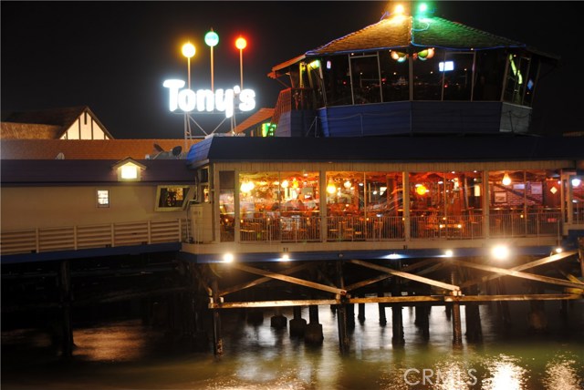 Approximately a mile North is the famous Redondo Beach Pier with fun, boat rentals, restaurants.  This is a night photo of Tony's Restaurant on the pier.