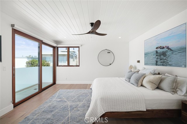 Primary bedroom with amazing natural light and views.