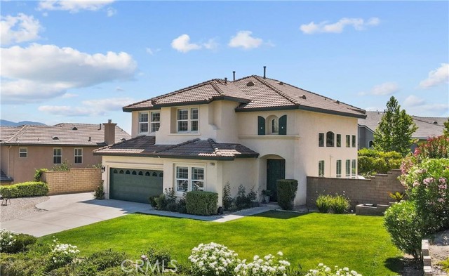 14230 Arches Lane Canyon Country, California Skip LA and the Valleys’ prices*** Prestigious Stone Crest Community. This is a home you will cherish for years to come! No MELLO ROOS and minutes to the 14 FWY makes this home a commuter's dream! Welcome to this stunning 5 bedroom + bonus room (that can be an office, den or additional 6th bedroom if needed.), 3 bath home with over 3,000 Sq Ft of pure luxury living space. FULL bedroom and bathroom DOWNSTAIRS! plus ample storage make this home perfect for in-law quarters or long term guests! As you walk in you will be greeted with vaulted ceilings Vinyl tile flooring,
gorgeous chandeliers lighting ,kitchen is bright and open with beautiful granite counters, stainless steel appliances, large center island, tons of storage, a walk-in pantry, eat-in dining area, opens to the family room complete with a cozy fireplace. Walk into elegant staircase that leads you to the primary suite where you will find the most amazing mountain views. RV PARKING!!! Close to amazing schools and parks. This home HAS IT ALL! HURRY WONT LAST**