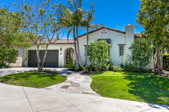 30 Wharfside Drive Newport Coast, California Breathtaking panoramic Ocean and Catalina views! Rare single level, open floorplan home located on a cul-de-sac within the iconic Crystal Cove community. This home is in the front row of the community, which means no homes to obstruct the beautiful views. Walk in through the tranquil front courtyard and you will feel like you are in a resort. Step in and you will find the open living room/ dining area that opens up to the backyard. The beautiful backyard is an entertainer's dream- with a stone patio, grassy area, beautiful garden, built-in BBQ area, and oceanfront views. Gourmet kitchen open to the family room which features Viking appliances, a Sub-Zero refrigerator, and large island. Cozy fireplace in the family room. Breakfast nook eating area off of the kitchen. High ceilings, tall windows, and French doors throughout make the home feel very spacious and also floods the home with a ton of natural light. Master Suite has big ocean views and opens up with French doors to the backyard. Conveniently located within walking distance to restaurants and shopping in The Promenade and Crystal Cove beach. Residents have access to the exclusive Canyon Club amenities, which includes 24-hour guard gate, swimming pool, hot tub, sport courts, walking trails with gorgeous views, fitness center, tennis facilities, and multiple playgrounds. Come enjoy coastal resort-style living at its best!