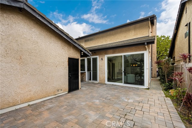 Beautiful paved private back area.