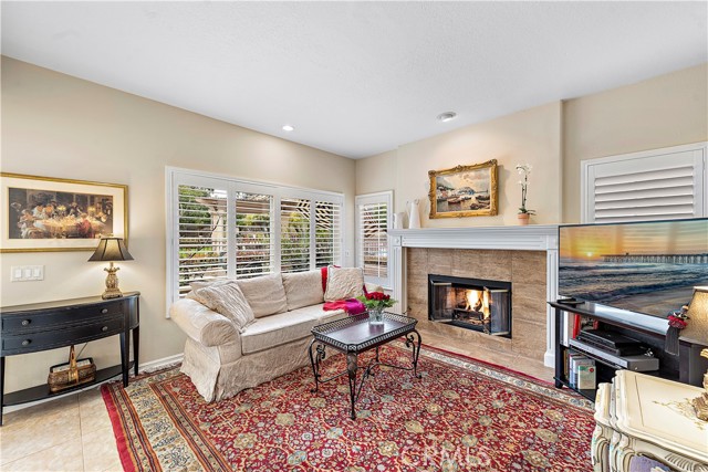 Cozy fireplace with custom surround and mantle