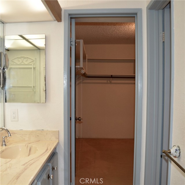 Primary bathroom with tub/shower and toilet.
