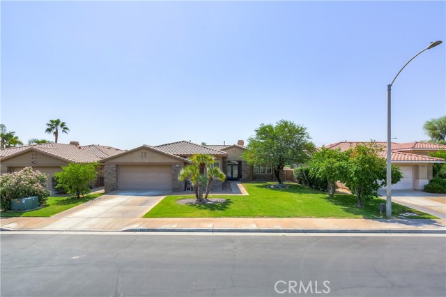 77651 Marlowe Court Palm Desert, California Premier living in the gated community of Whitehawk. This tastefully remodeled 2600 sqft. single story, boast high ceilings and functional open concept. Elegant Ceramic tile throughout the living spaces accented by quartz countertops give the perfect blend of modern. Paid off solar panels and 2 oversized recently installed Lenox air conditioning units help keep the bills down and the house cold in the hot summer months. In ground pool and covered patio make perfect for relaxing or entertaining.