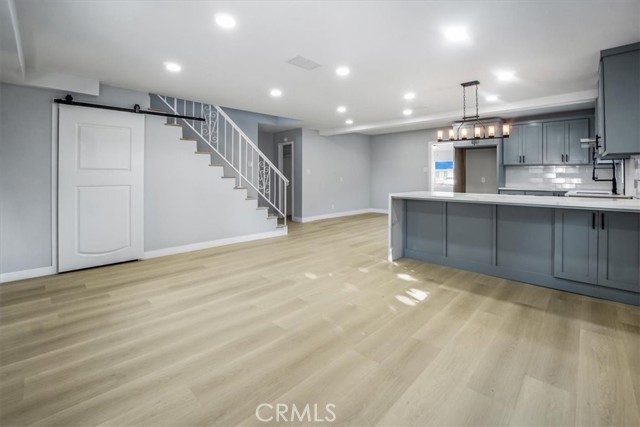 View from living area to stairwell leading to 2nd floor