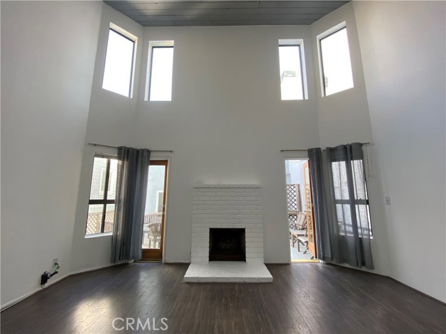 55 18th Street Hermosa Beach, California One of Hermosa's best Walk Streets. A 2 bedroom 1 bath stand-alone(separate) house with 1300 Sq Ft and only 7 houses from the Strand. Property has soaring high ceilings, new dishwasher, fireplace, hardwood floors, new (inside) washer and dryer. Interior is freshly painted and has a rooftop deck with Palos Verdes views, and a lower deck. It is located at the back of the walk street just steps to the beach and walk to downtown. There is also parking for up to 3 cars. Prefers a 3 month lease and then go month to month.