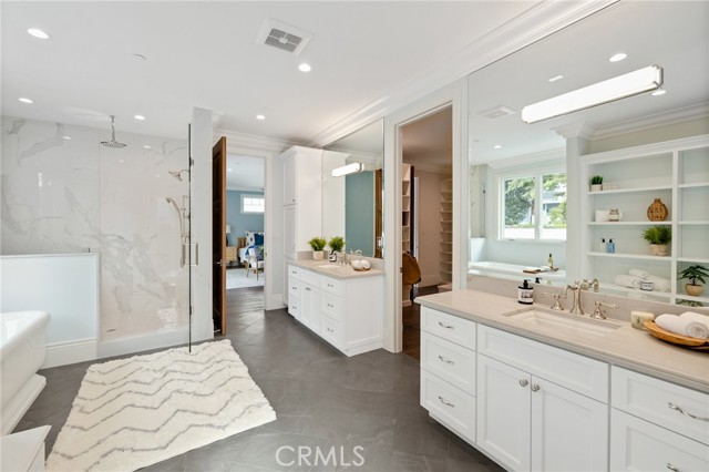 Master Bath Retreat with Dual Vanities and Designer Fixtures and Finishes