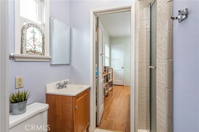 Home's 2nd bathroom  is an inviting 3/4 Bathroom between middle and back bedrooms.