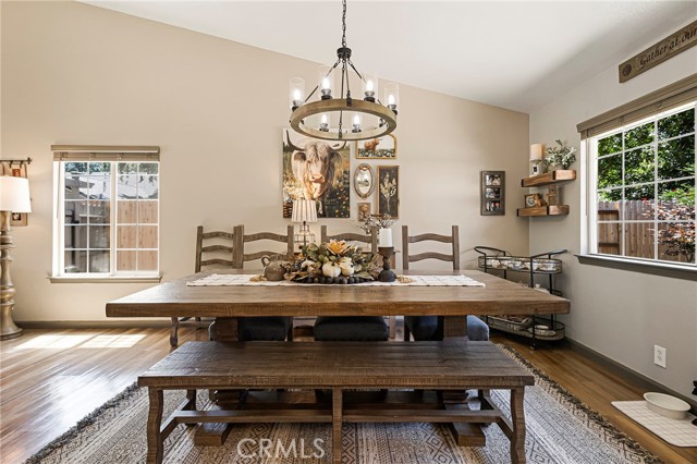 Open dining area with new light fixture.