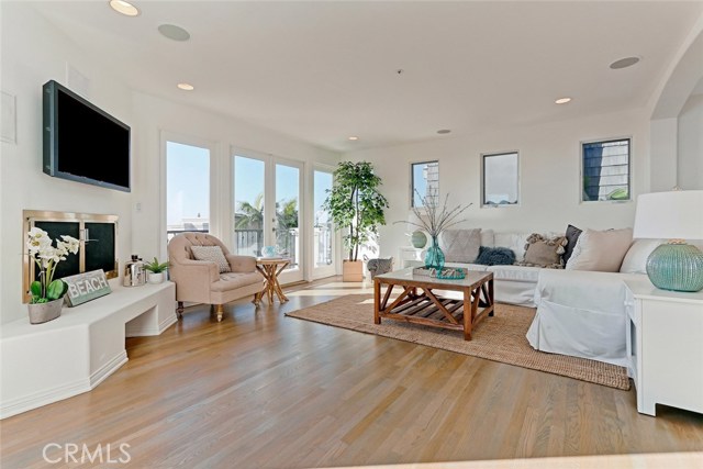 living room looking from wet bar area  north west, extremely bright home