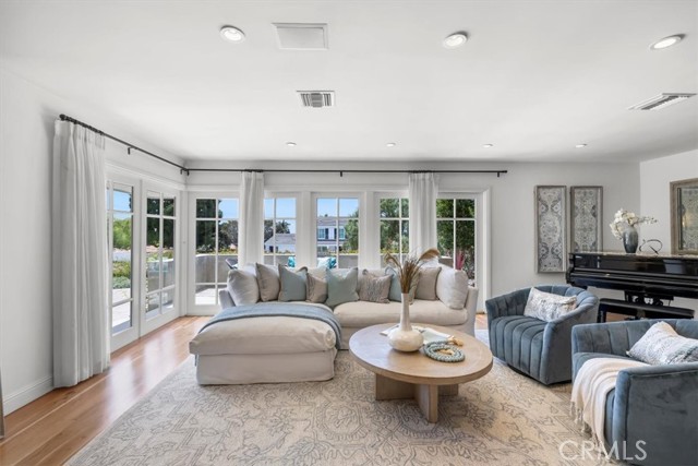 Lovely living room with French Doors leading to new Patio with Ocean and Catalina Views.