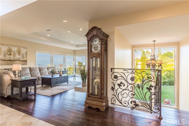 Formal living room with balcony and so many windows to enjoy the 24-hour view.