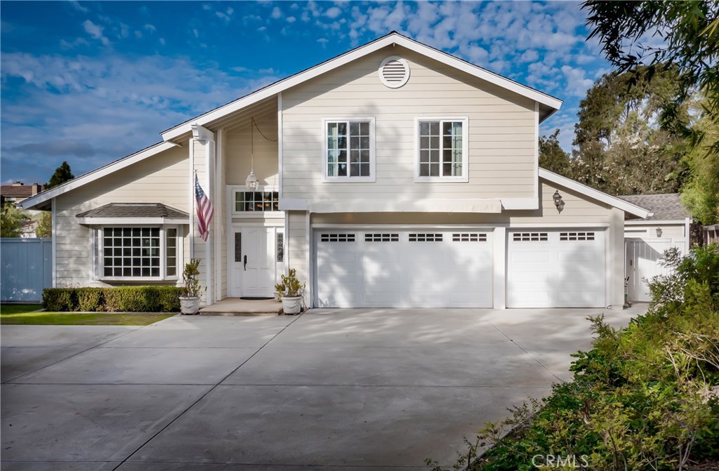 A private drive leads to this coveted Dana Crest home on an incomparable parcel bordered by a coastal ravine & mature trees. Prioritize your visit to see why the home was selected by one of the original developer's VPs as their personal residence & the second owners loved & improved the home so much over the years. Enormous lot with room to expand & do whatever your heart desires. Welcoming foyer with cathedral ceilings, a living and dining room with sunset view that you will love to use & a re-oriented staircase with wood & iron bannister. Custom kitchen with quality cabinetry, roll-outs, stainless steel Wolf appliances, huge skylight and exotic stone countertops all open to the breakfast area and expanded family room with cozy wood burning fireplace. Completely remodeled including smooth ceilings, leveled living room floor with no step-down, wood floor, large baseboards and high-end Milgard dual glazed windows. 3 remodeled baths, 3 closets in master suite, composition roof, CAT-5 data wiring, attic storage with ladder, whole house water filtration, 3 car garage with roll up doors and extension awning for shade while working in the driveway, separate workshop, block wall and wrought iron fence & RV parking galore. Enjoy ocean breezes, peace, nature, walk to parks, shopping and entertainment while living close to the ocean & sought after schools. No HOA & No Mello Roos Tax.