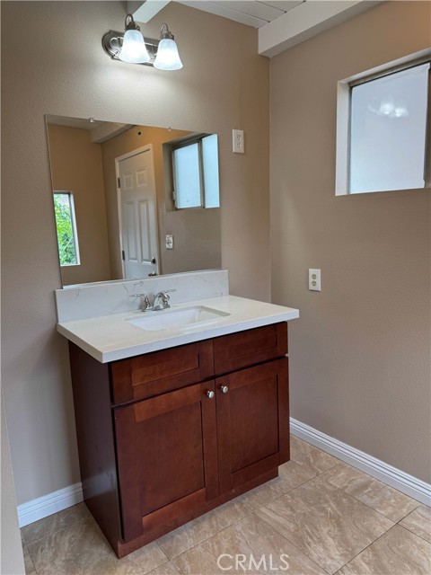 Master bathroom can be accessed from backyard