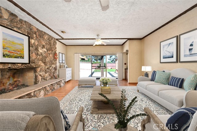 Welcome to 9325 Buell St! **Virtually Staged**Living Room with views of the backyard