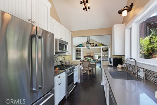 Kitchen opens to dining room