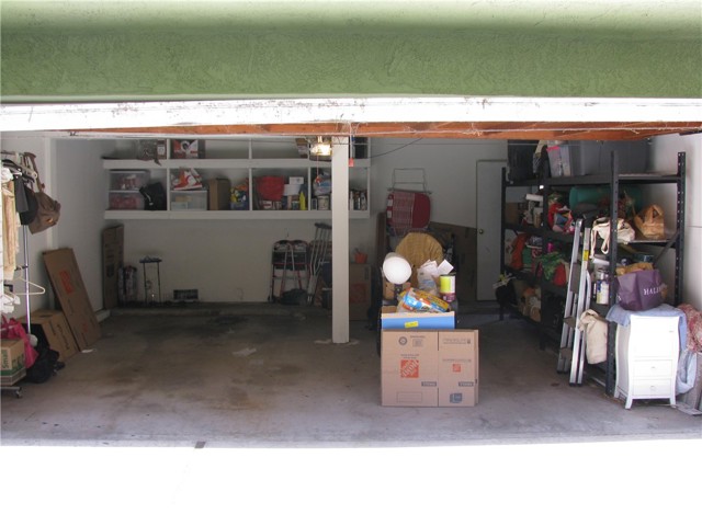 2 Car Attached Garage with plenty of  storage shelves