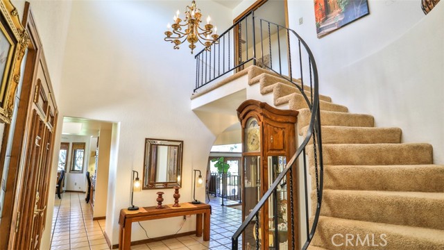 Stairway to the entire second-floor primary suite