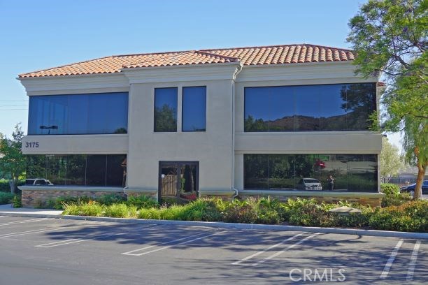This office building at the Conejo Ridge Executive Center consists of approximately  6,523 sq ft.  Offering extensive window line and abundant surface parking, this property shows well and is light and bright.  The Conejo Ridge Executive Center is located adjacent to the US 101 Freeway with freeway visibility, easy on/off freeway access via Wendy Drive in Thousand Oaks and numerous retail and dining options nearby.  This is the best small office available in the Conejo Valley. The owners association makes it easy to manage, with the owner only responsible for their building. The grounds, parking lot and other common areas are professionally managed & maintained, and shows well. 

Suites range in size from 577 sq ft, to 3,200+ sq ft. It's a 2 story office building, with an elevator, and is easy to show. Call to schedule a viewing. Lease rates are currently $1.80/psf/mg. Each suite has separate electric meter and hvac unit. Call for listing agent for current/additional information.  

The building has a new roof with 10 year warranty. All HVAC units have been inspected and serviced, as well as the elevator car and fire sprinklers. This building is turn-key.  

The Conejo Valley, located along the Hwy 101 corridor, has long been exalted for its superior lifestyle, excellent Mediterranean climate, affluent residential character and various residential options, beautiful mountain views, shopping and other amenities