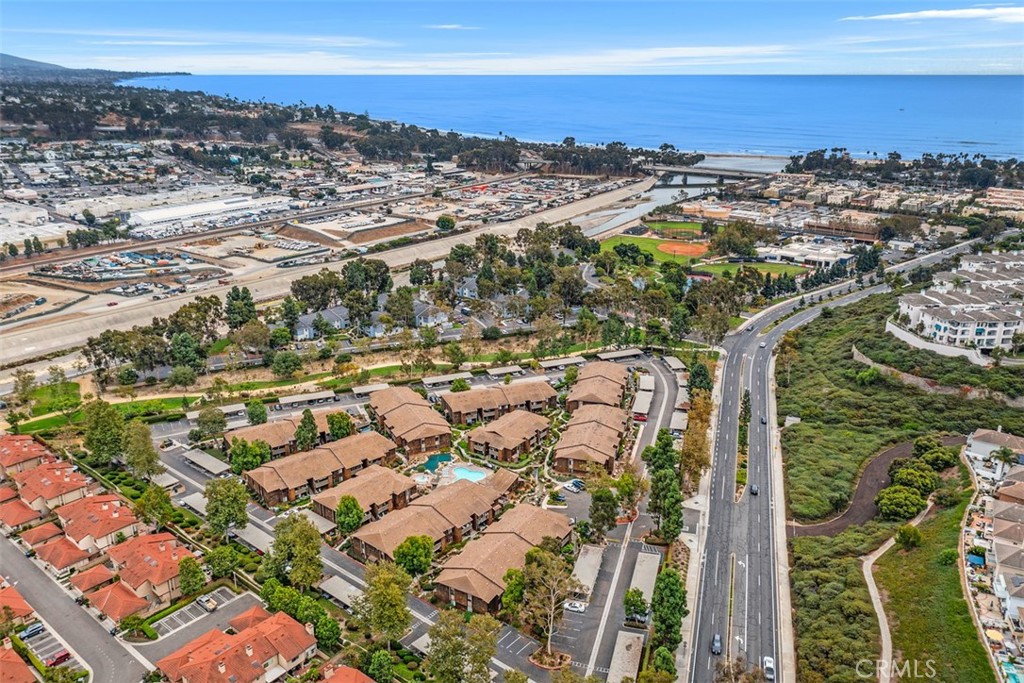 Beautifully remodeled 2 bedroom, 2 bath Harbor Creek unit in the heart of Dana Point. This well maintained, water themed community is located walking distance to Doheny Park (surfing, volleyball, & sand), Dana Point Harbor, shopping, services, public transportation  and restaurants. Sycamore Creek Park
and Trail is adjacent to Harbor Creek  is accessed through a secured pedestrian gate. The park is great for walking dogs and children, has fitness apparatus within the grounds and along the trail connecting  to Del Obispo and Creekside Parks. Community amenities  include pool & spa, areas for dogs, carports, and controlled gate to parking. Nearby Del Obispo Park has tennis, pickleball, handball and basketball courts.