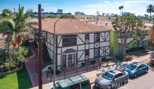 2104 E Florida Street Long Beach, California 2104 E. Florida Street is an impeccably renovated eleven-unit investment property located in the highly desirable Fourth Street / Retro Row neighborhood of Long Beach. The 1940's-built property offers ten 1 BD / 1 BA units and one studio unit with ample storage and four garages.
Extensive interior renovations totaling over $50,000 per unit include new laminate flooring, custom shaker-style cabinets, quartz countertops, in-unit washer/dryers (all but two units), stainless steel appliances, designer bathroom tile, pedestal sinks, and modern lighting, ceiling fans and fixtures throughout. New exterior and building system renovations include HVAC and tankless water heaters for all units, new electrical and plumbing systems and new garage doors. The Fourth Street / Retro Row location is desirable for young urban professionals seeking close proximity to employment opportunities in Downtown Long Beach, along with a plethora of shopping and dining amenities. 2104 E. Florida Street provide an investor with a turnkey condition property in a highly popular Long Beach rental market at a 4.53% cap rate on current rents.