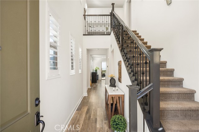 Welcoming Entryway with Elegant Staircase