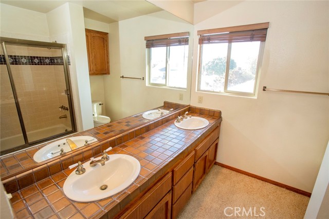 Upstairs Hallway Full Bath: Duel sinks, Tub/shower.