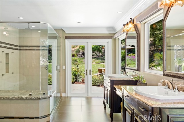 French doors with views and access to the backyard.