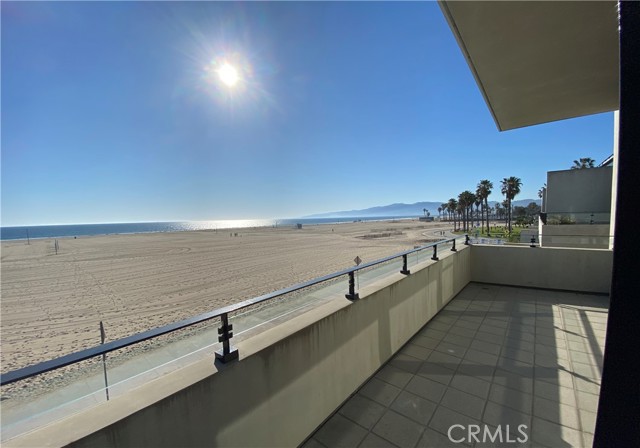 Oceanfront upper level condominium home with 2883 square feet. Renovated 2022. Panoramic ocean and sunset views from Palos Verdes to Malibu. Situated directly off the Venice beach boardwalk you can experience the Venice lifestyle with 3 bedrooms, 3.5 bathrooms, a large patio-balcony overlooking the boardwalk, private rooftop deck, and 4 garage parking spaces (2 tandem spaces in a shared garage). Entertain friends and family with an open living/dining area that opens to a large patio-balcony directly over the Venice boardwalk. Each bedroom features their own full bathroom, plus one guest powder room (half bathroom) off hallway; total of 3.5 bathrooms. Fireplace located in the living room and another fireplace located in the master suite. Master suite includes large walk-in closet with plenty of space and large 5 fixture bathroom. The master bathroom includes a large bathtub, freestanding shower, double sink vanity, and a private throne room for the toilet.