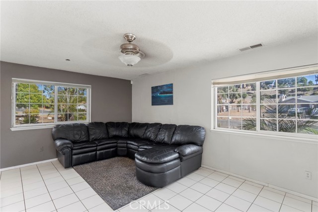 Large living room with lots of natural light