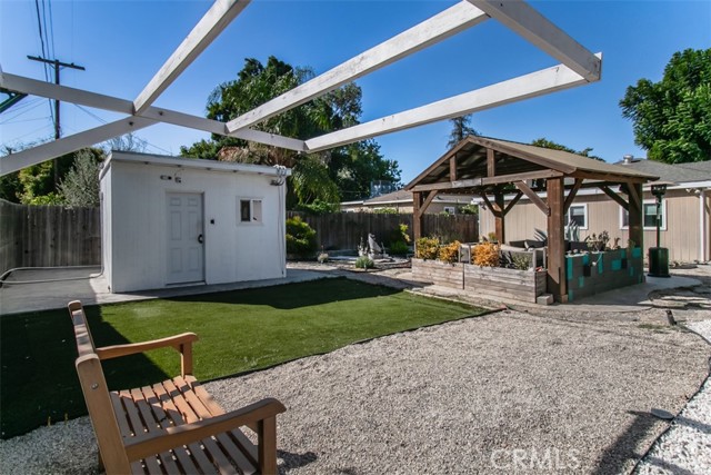 Large Shed on concrete Slab by Artificial Grass