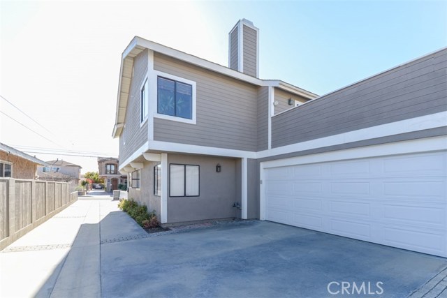 Two on a lot townhome only attached at the garage wall